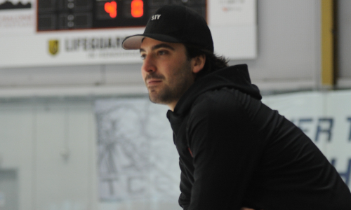 CLF Chicago Advisory Board member Lewis Simon at the hockey rink coaching youth athletes