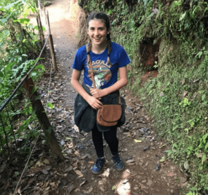 Legacy Donor Alyssa Peterson on a hike in the forest