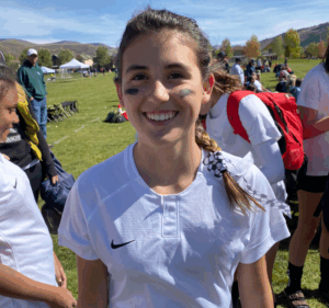 Legacy Donor Alyssa Peterson on the pitch in her soccer uniform