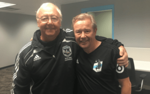 Former professional soccer player John Tudor with son