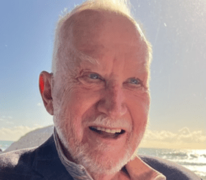 Legacy Donor and former college football player Jim Huge smiles