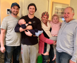 Legacy Donor and former college football player Jim Huge with his family