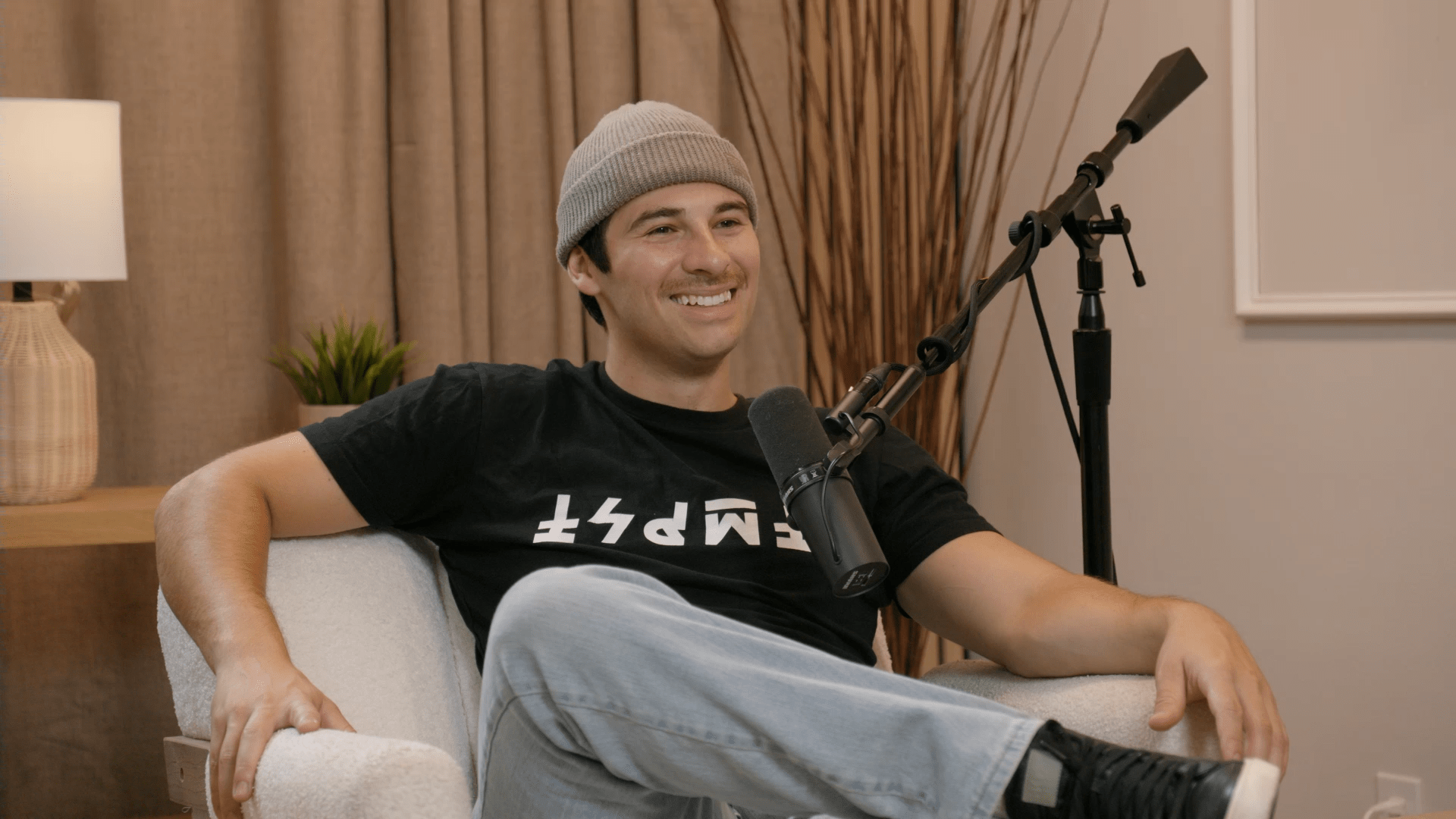 Professional parkour athlete and Hollywood stuntman Corbin Reinhardt speaks in front of a microphone