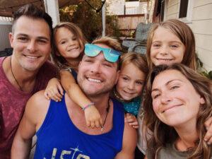 Former NFL player and Legacy Donor Devon Wylie with his siblings, nephews, and nieces