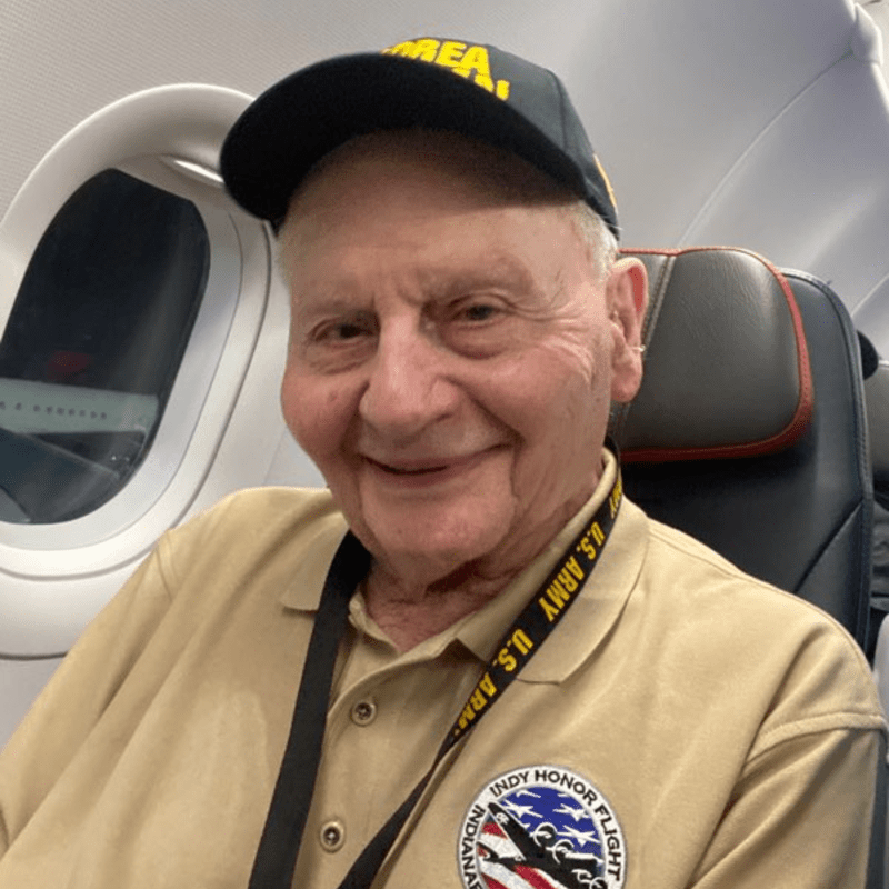 Legacy Donor Al Neyman sits in an airplane